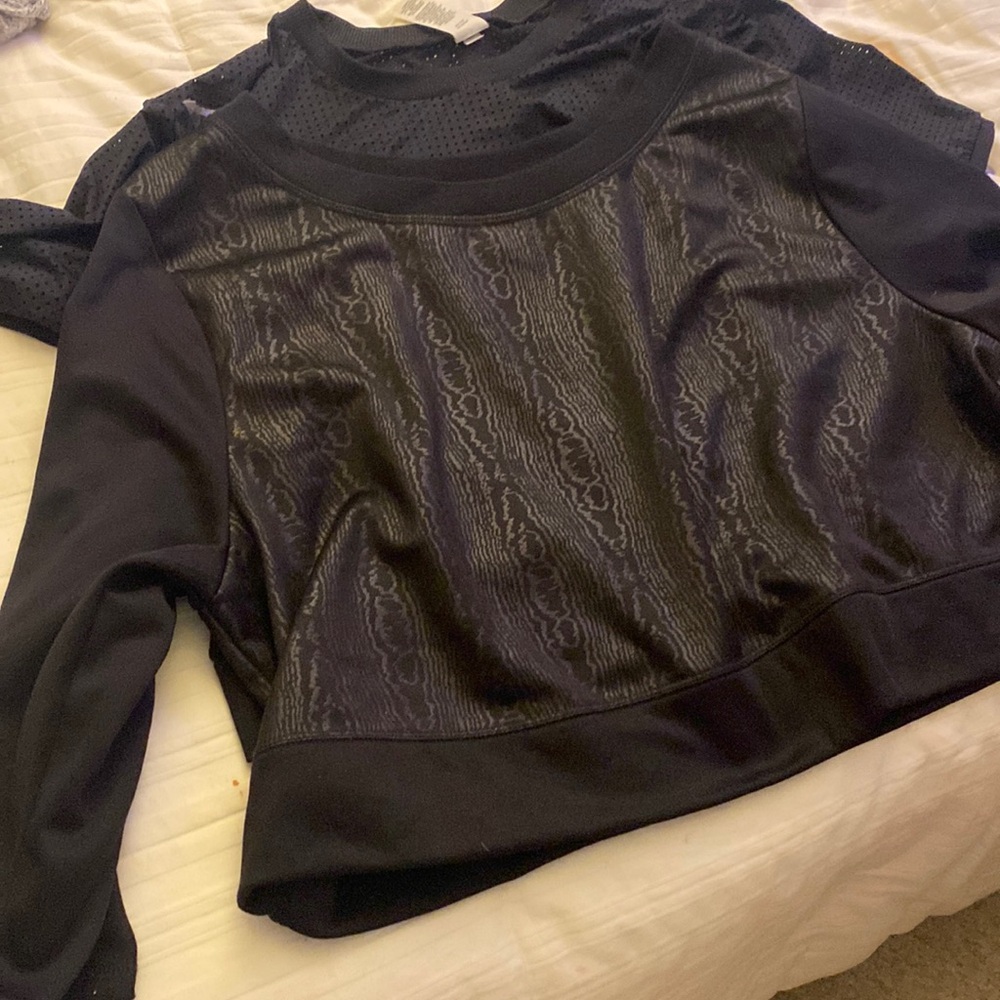 2/2 black shirts, one short sleeve one long.xl&18/20 never worn never washed